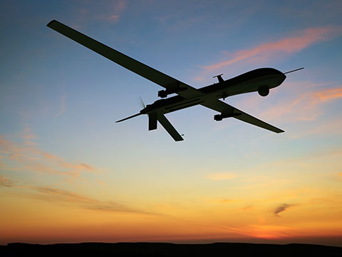 Drone flying across sky