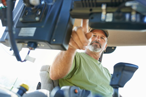 Farmer in tractor