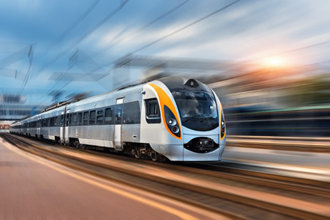 Train speeding down tracks