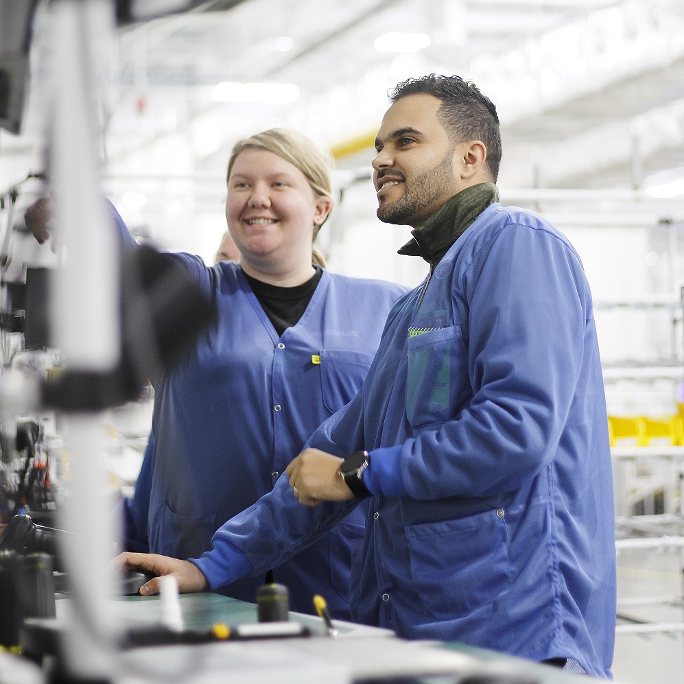 plexus employees at manufacturing workstation