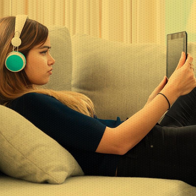 Young girl watching video on tablet