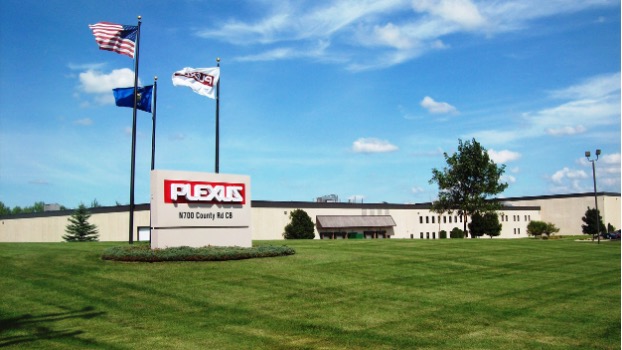 A large building with a white facade and a Plexus sign in the lawn out front, identified as the Plexus Appleton site in the United States.