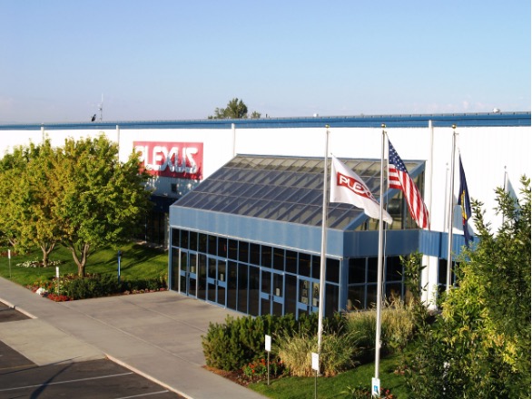 A building with a white and blue facade and a Plexus sign on the front, identified as the Plexus Boise site in the United States.