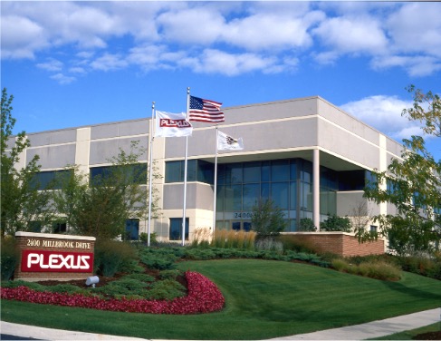 A building with a gray facade and a Plexus sign out front, identified as the Plexus Chicago site in the United States.