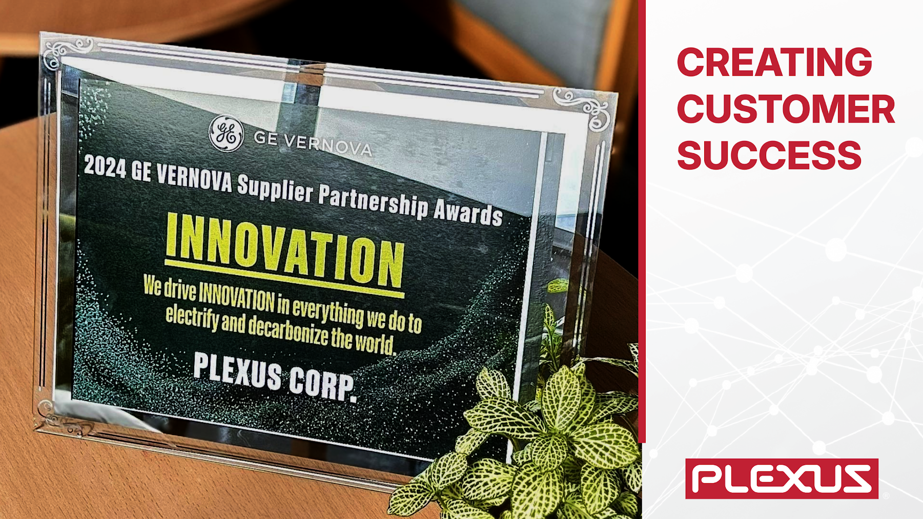 A picture of the GE Verona Supplier Award with a title next to it of "Creating Customer Success"